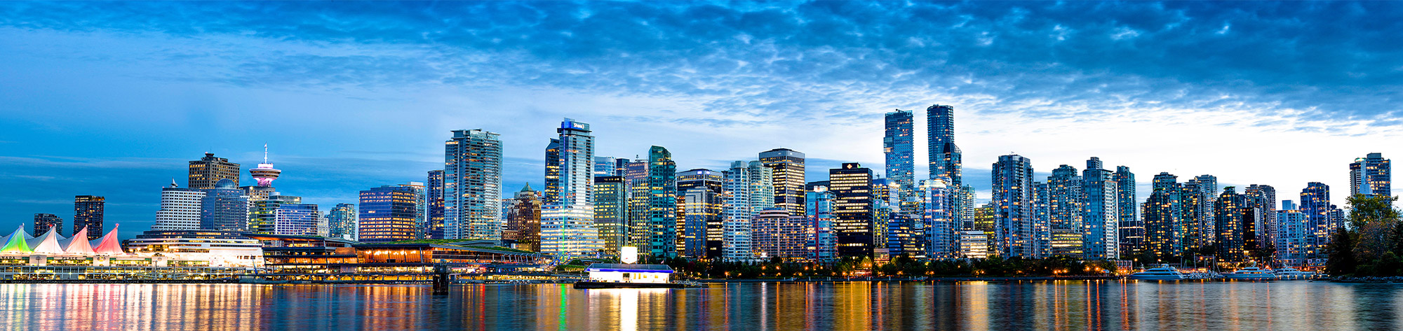Evening skyline of Vancouver, British Columbia, where Bekatec provides online solutions